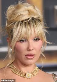 What HAS Millie Bobby Brown done to her face? Cosmetic surgeons weigh in as  fans say Stranger Things star, 21, looks 'a decade older'