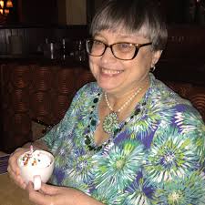 What town near Griffin has a nice downtown area with shops and restaurants  where people can walk around?