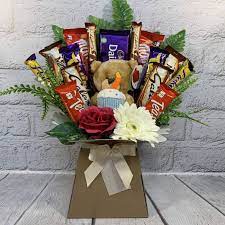 Send birthday flowers same day with ftd sending flowers is a thoughtful, simple way to demonstrate how much you care, and we have arrangements suitable for him or her. Happy Birthday Bear Chocolate Bouquet Funky Hampers