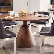 This dining table is made of solid sheesham wood. Reclaimed Wood Pedestal Dining Table