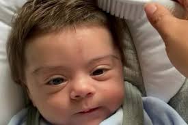 Hd00:15beautiful woman opens her eyes after sleep and smiles. Newborn Baby S Extraordinary Thick Head Of Hair Leaves Family Stunned Wales Online