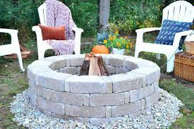 It uses firewood as fuel. How To Build An Easy Backyard Fire Pit Hgtv