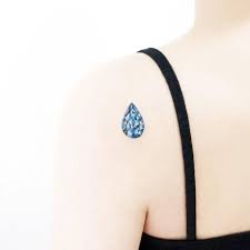 Black And White Gemstone Tattoo Tear Drop Jewel Tattoo By Tattooist Ida Tattooistida Ida Jeweltattoos Color Realism Realistic Hyperrealism Teardrop Tattoo Crystal Tattoo Jewel Tattoo