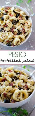 This Pasta Salad Is Covered In Pesto Bacon Cheese And Olives It Is Always The First To Go When I Serve It Pesto Tortellini Salad Tortellini Salad Recipes