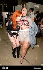 Miami, FL, USA. 18th Sep, 2021. Cam Models the Exxxotica Expo held at the  Miami Airport