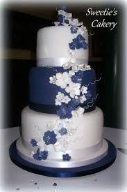 Blush and ivory wedding cake. Http Facebook Com Sweetiescakery Navy Blue White And Silver Wedding Cake With Flowers Navy Blue Wedding Cakes Wedding Cakes Blue Wedding Cake Navy
