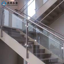 These designs are becoming extremely popular and very trendy! China Modern Glass Design Stainless Steel Stair Railing For Safety China Stair Railing Staircase