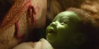 In Wicked (2024), the onlookers are shocked by baby Elphabas appearance.  This is because unlike typical newborns, she is born spotlessly clean,  wrinkle-free, abnornally large, and capable of laughter. :  rshittymoviedetails