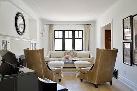Palazzo gray leather swivel accent chair $ 1,499.95. Caramel Leather Wingback Chairs With White Nailhead Stools Transitional Living Room