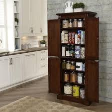 Homcom 72 traditional colonial kitchen pantry cabinet with 2 large storage areas, drawer, and adjustable shelves, white. Homestyles Cherry Food Pantry 5005 69 The Home Depot