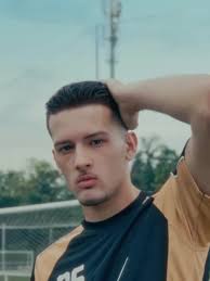 Justin Harbour Wearing His Haircuts