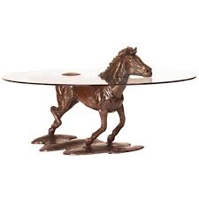 Features glass top based on three wooden horses sculptures. Bespoke Bronze Sculpture Mark Stoddart Horse Coffee Table