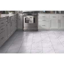 We carry aluminum and vinyl peel and stick tiles as well as genuine carrara marble tiles on a peel and stick adhesive backing. Trafficmaster Carrara Marble 12 In X 24 In Peel And Stick Vinyl Tile 20 Sq Ft Case Ss1212 The Home Depot