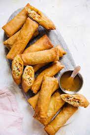 Place a spring roll wrapper in front of you so there is a point facing towards you. Crispy Vegetable And Pork Spring Rolls Recipe Healthy Nibbles