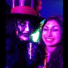 She slinks through shadows, feeding