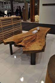 Admire your new fancy coffee table and laugh at all of the places that sell them for $1,000+. Salvaged Tree Furniture Salvaged Wood Furniture Coffee Table Wood Tree Furniture