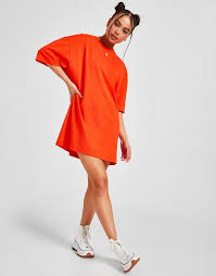 You'll be earning style points in a basic women's t shirt dress styled down with fresh sneaks and an oversized denim jacket. Converse Oversized T Shirt Dress
