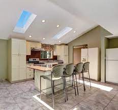 For vaulted ceiling lighting it is recommended to install sloped ceiling specially designed recessed light fixture parts. 42 Kitchens With Vaulted Ceilings Home Stratosphere