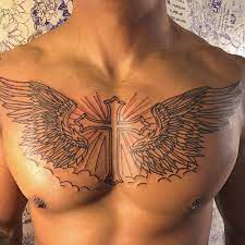Stylish tribal cross chest tattoo. Pin On Tattoos