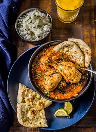 Spicy chicken and shrimp curry imparts a garlicky taste, finished with the herbaceousness of cilantro. Authentic Instant Pot Indian Chicken Curry Recipe Murgh Curry Simmer To Slimmer