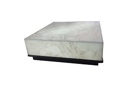 An innovative table design that uses arcs inspired by tensile structures. Onyx Coffee Table White Onyx Design Xclusives
