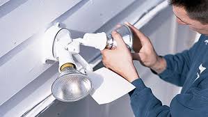 The ring pro is secured to the wall with two screws, and the protective faceplate snaps in place and is secured with a small screw. Outdoor Garage Lights Learn To Install Them In 8 Steps This Old House