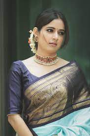 Pin By Dhanu On Ashika Rangnath Traditional Blouse Designs Saree Hairstyles Saree Trends