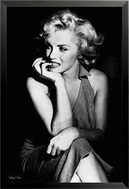 Does not have a white border, this is just for the picture.) you may chose print only or have it framed. Mercer41 Marilyn Monroe Sitting Poster Framed Photographic Print Wayfair