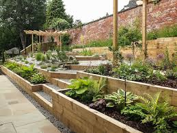 Modern Garden With A Rustic Twist Jb Landscapes Modern Garden Sloped Garden Sloped Backyard