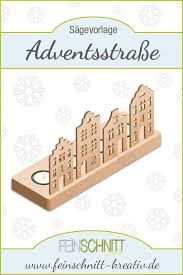 Es ist sehr faszinierend wie aus buntem papier, das geschnitten und geklebt wird. Adventsstrasse Feinschnittkreativ Laubsage Vorlagen Weihnachten Teelichthalter Basteln Basteln Weihnachten