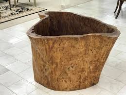 The versatility of tree trunk side tables allows them to look equally great in both rustic and modern settings. Encore Furniture Gallery Salvaged Hollow Tree Trunk Dining Table