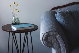 If you're styling a round coffee table and you want a simple, arranged look, try dividing your table into thirds or quadrants. How To Decorate A Round Coffee Table
