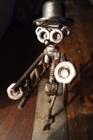 Scrap Metal Man At Work A Cool One Off Piece I Got In A Junk Sale The Sculpture Is Made Up Of Old Nuts Washers Coils And Bi Scrap Metal Metal Cool