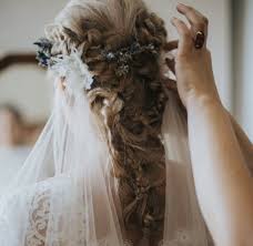 A veil completes the wedding gown. Wedding Hairstyles With A Veil 12 Fairytale Perfect Looks To Consider