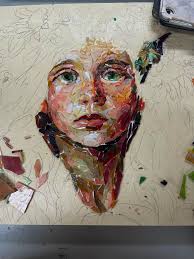 Her name is “ Solstice” Bringing the sun back to Alaska. GOG- old porthole  window-scrap glass- weld bond- charcoal grout.