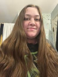 My Hairdresser Sonya Wade just finished washing and blow drying my hair  with my Hair Products I usually bring with me to the Salon. Now she is  going to twist my hair