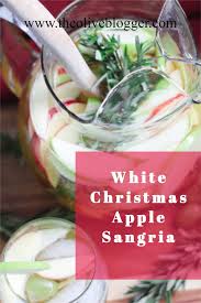 White Christmas Sangria The Olive Blogger Recipe In 2020 Apple Sangria Christmas Sangria Christmas Sangria Recipes