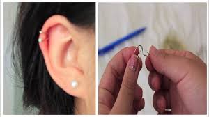 With over 100 million ears pierced by our certified experts, we are the ear piercing specialists. Diy Fake Cartilage Piercing W Paperclips Super Easy Fake Cartilage Piercing Cool Piercings Paper Clip