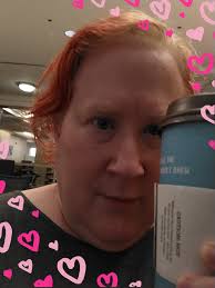 Pic of me with my free large coffee! The coffee shop in the University  Library where I work from is training today. Word of mouth of limited  freebies spread.