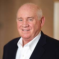 About John E. Featherston — RISMedia