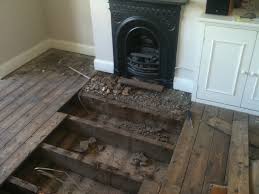 I wish i could say that removing fireplace tiles and preparing the surround for new tiles was an easy task. Removing Fireplace