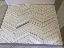 Helsinki Marble Installation In Our Chantilly Va Showroom Architectural Ceramics Tile Patterns Herringbone Pattern Wood