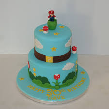 If you have a daughter she may be a fan of a more regal themed mario birthday party. Two Tier Super Mario Cake