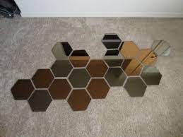 With paper tape or duct tape, arrange the mirrors as shown in the picture, with a little separation between them, for future bending. 20 Best Hexagone Arrangement On Wall Ideas Mirror Wall Decor Mirror Design Wall Hexagon Mirror