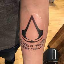 101 Amazing Assassin S Creed Tattoo Designs You Need To See Assassins Creed Tattoo Tattoos Tattoo Designs