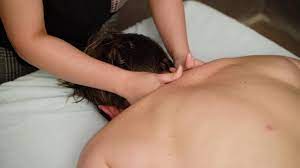 Balinese massage in spa salon. Massage parlor. Relaxing massage applied to  the neck and waist. 8741427 Stock Video at Vecteezy
