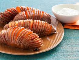 Sweet potatoes are mashed with butter, brown sugar, milk and lemon zest, shaped into a ball with a marshmallow in the center, and rolled in cereal crumbs before baking. Our Best Healthy Sweet Potato Recipes Food Network Recipes Dinners And Easy Meal Ideas Food Network