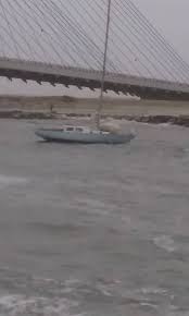 Sailboat Anchored In The Indian River Inlet Rescued By Coast