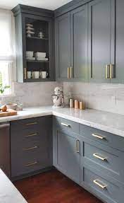 Gray kitchen cabinets & trends. Dark Gray Cabinets And Brass Hardware Kitchen Kitchen Cabinet Design Kitchen Interior Kitchen Renovation