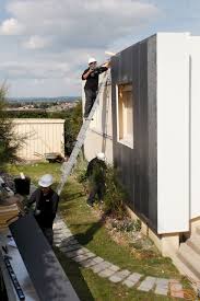 Mise En Oeuvre Saint Vallier Chantier Face Blanche Uniso Facade Renovation Isolation Batiment Construction Isolation Exterieur Isolation Architecte
